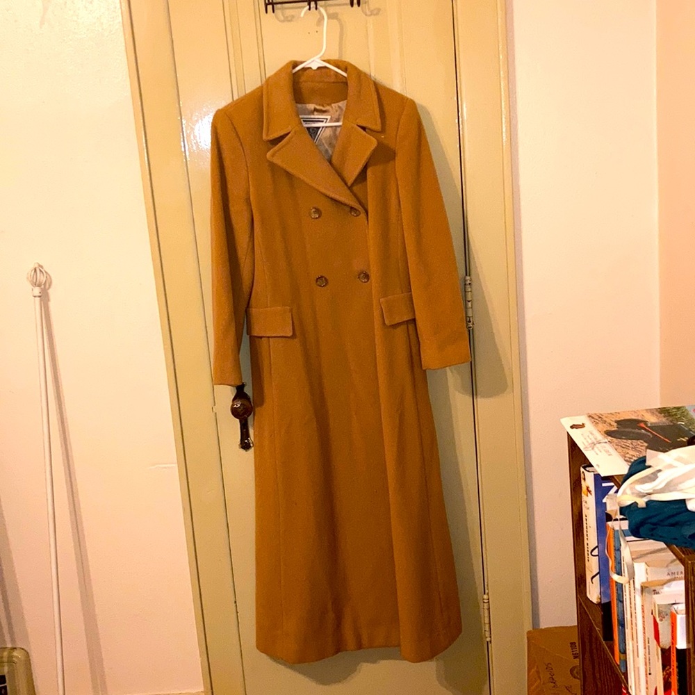 Full length Camel color button down winter coat.